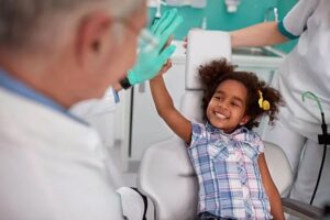 pediatric dentist child in dental chair