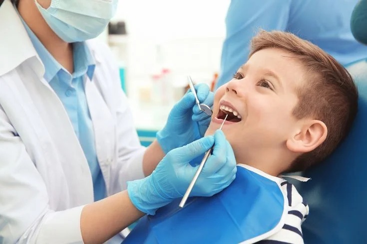 young child visiting the dentist
